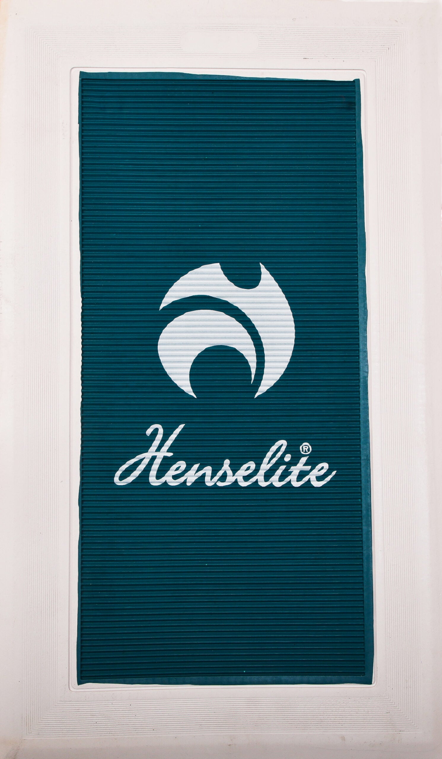 A white and blue delivery mat with the Henselite logo printed in white.