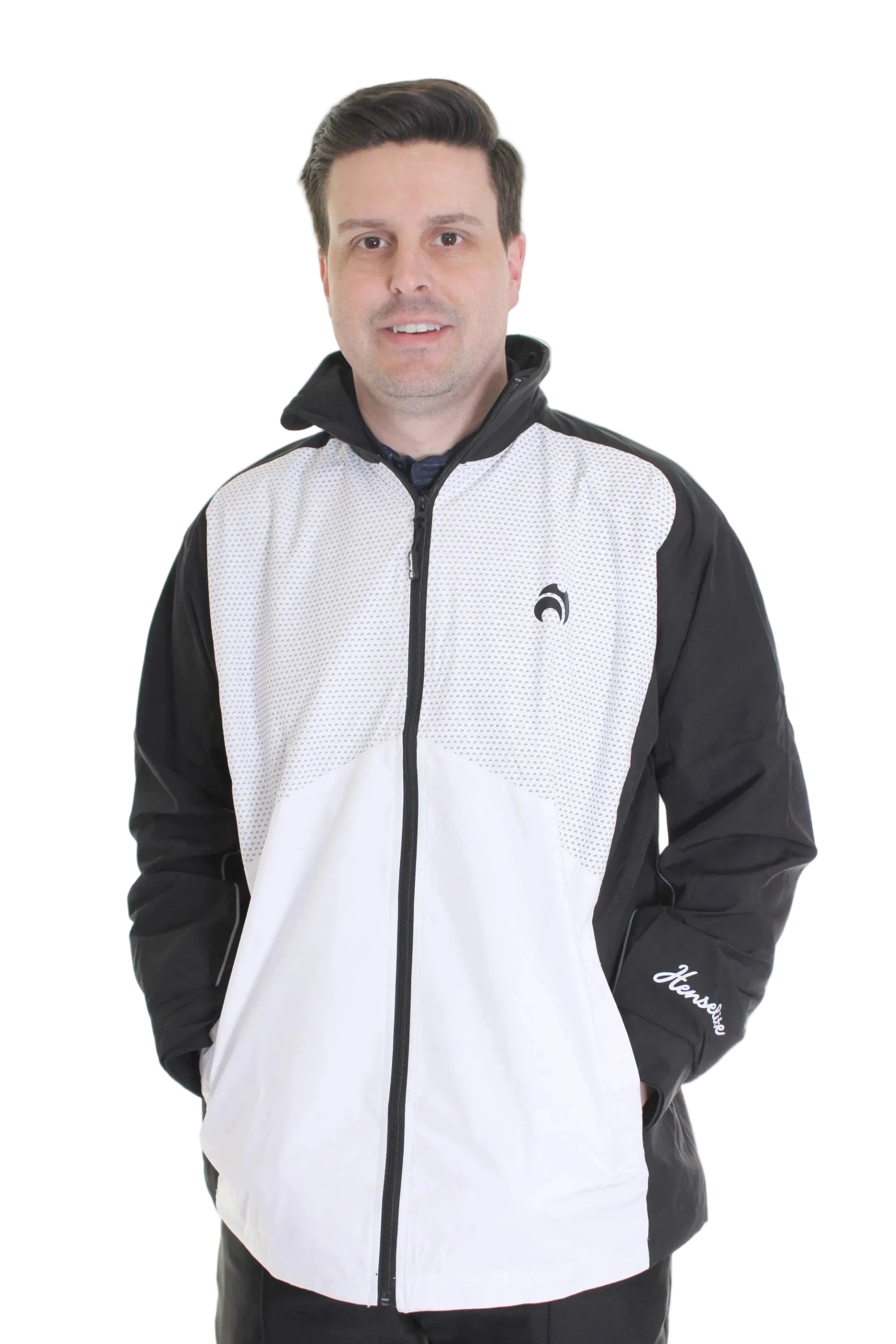 Man wearing a black and white jacket with a logo on a white background