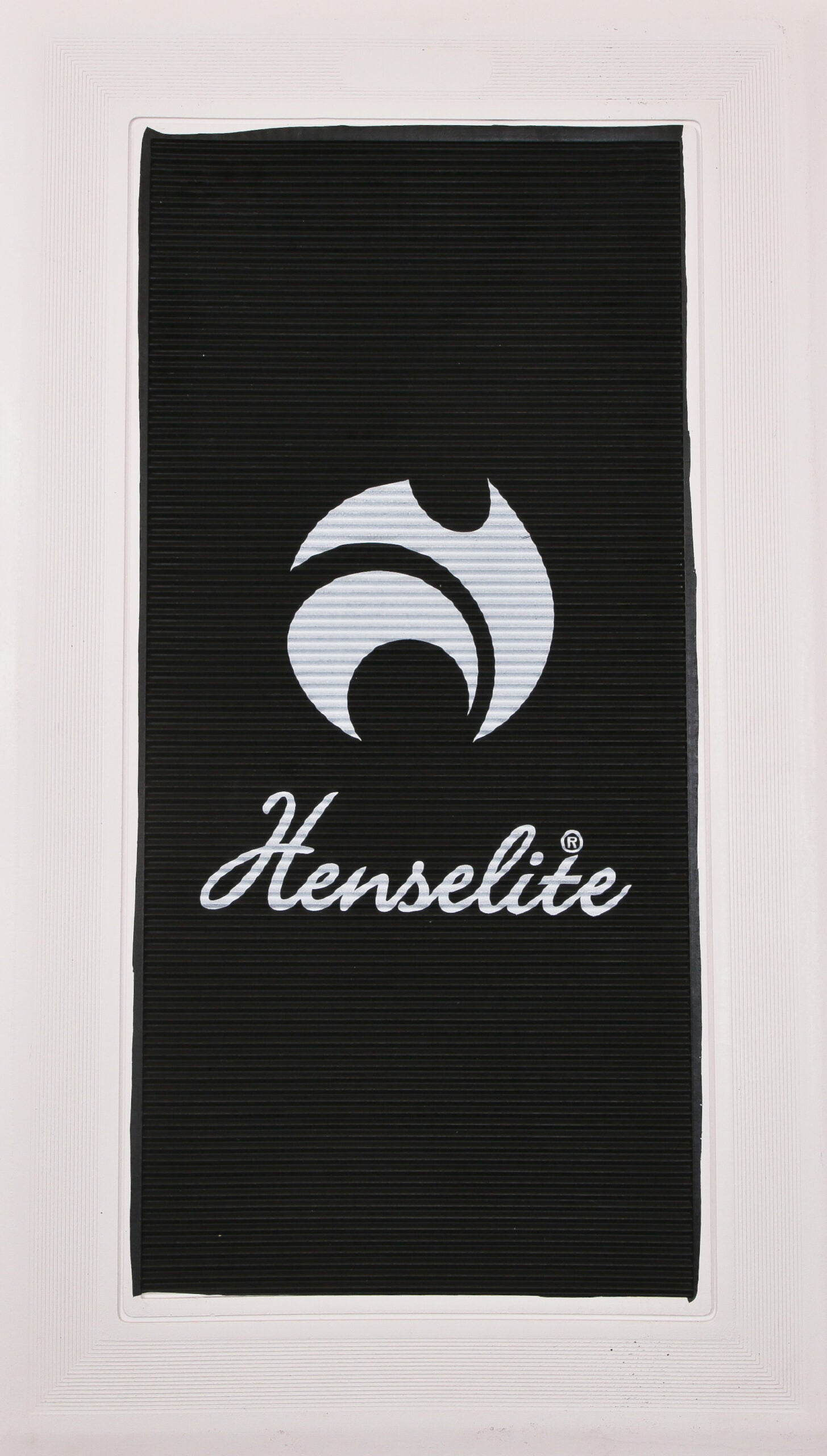 A black delivery mat with the Henselite logo printed in white.