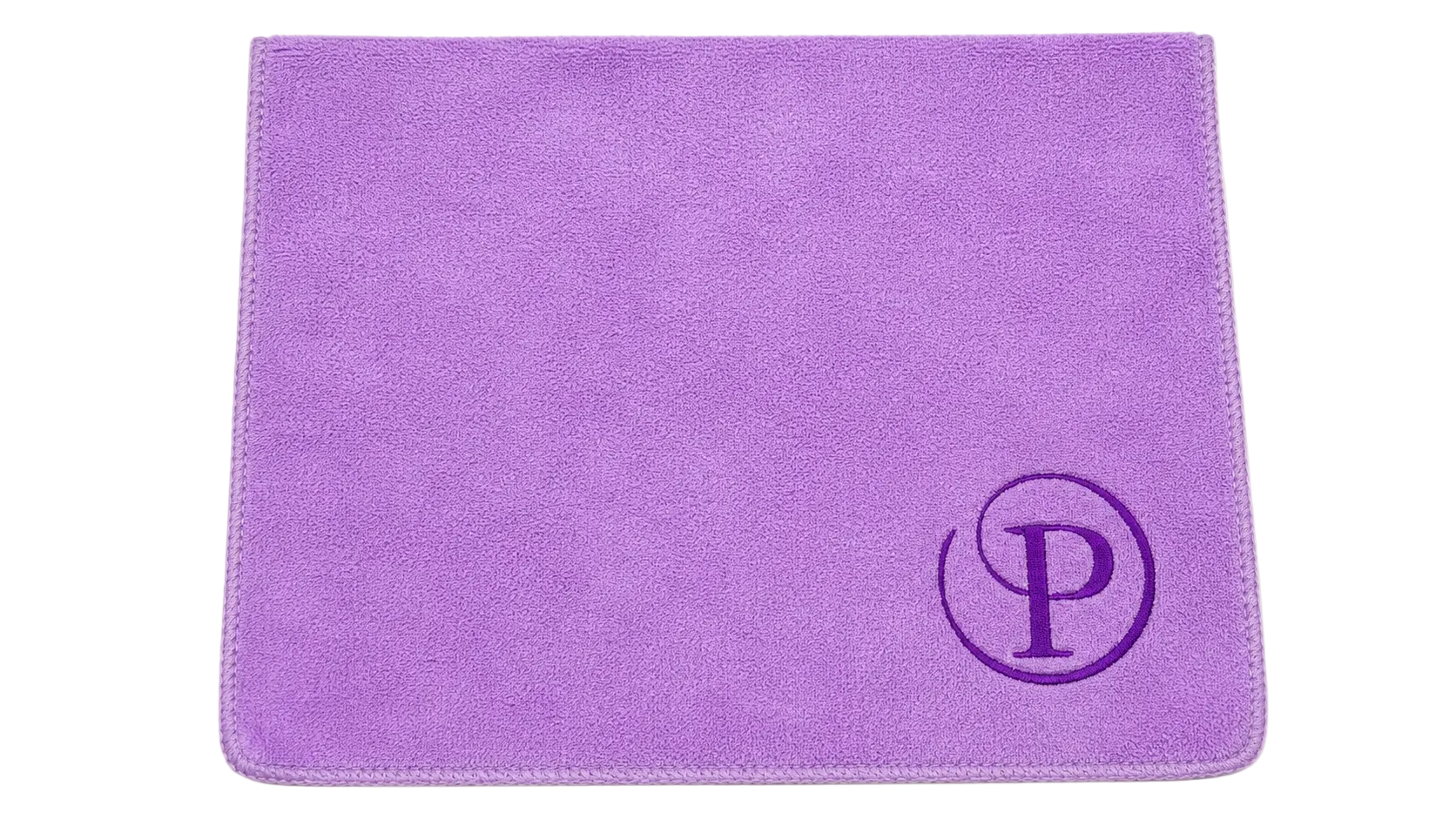 Purple towel with a monogram 'P' on a white background
