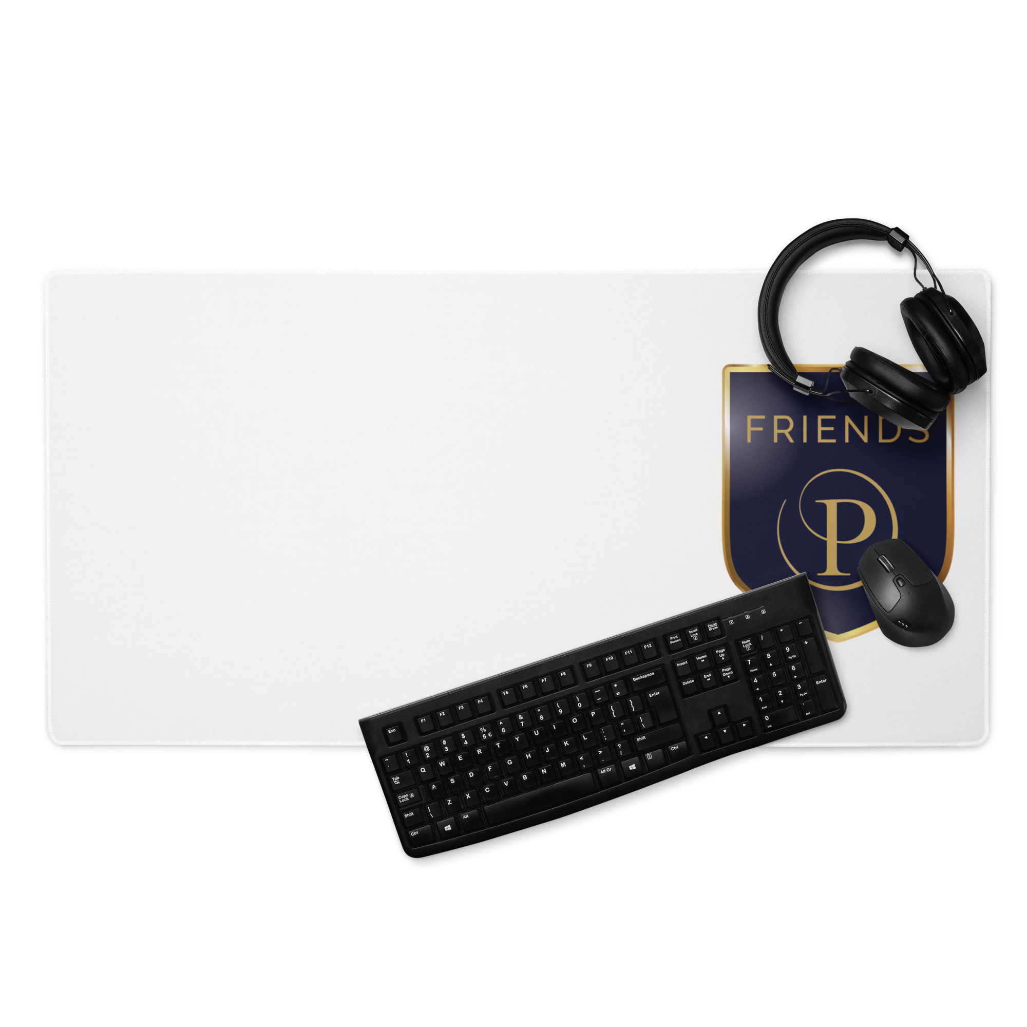 White desk mat with keyboard, mouse, and headphones on a white background