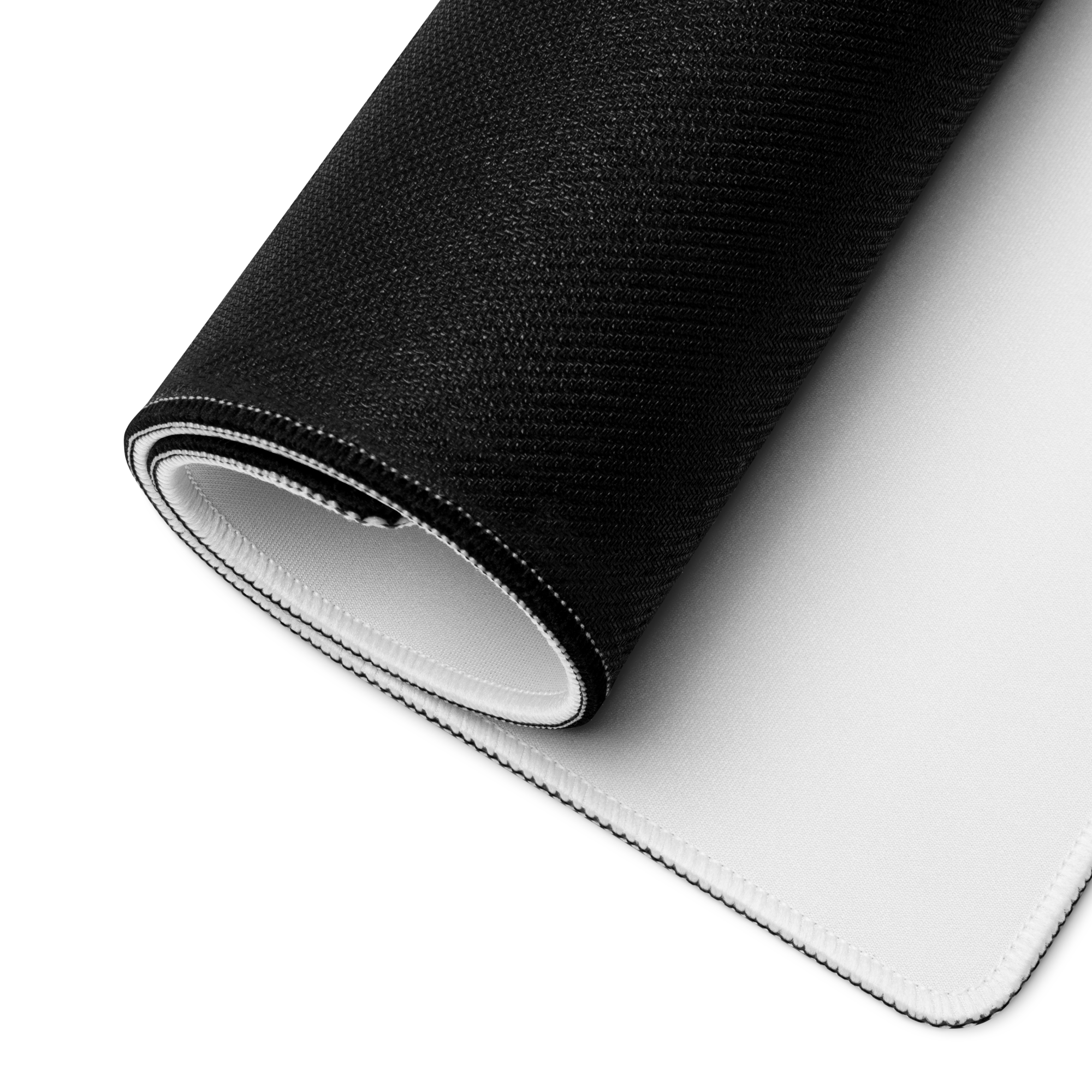 Roll of black and white fabric on a white background